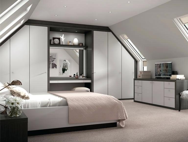 Contemporary fitted bedroom with matt grey storage by UKB