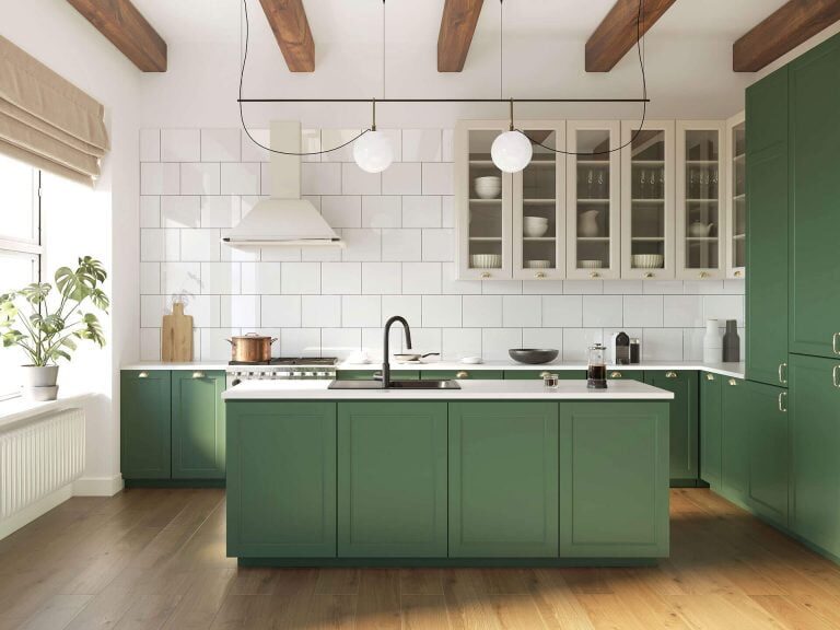 Green kitchen cabinets by UKB